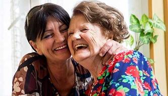 woman hugging her mother